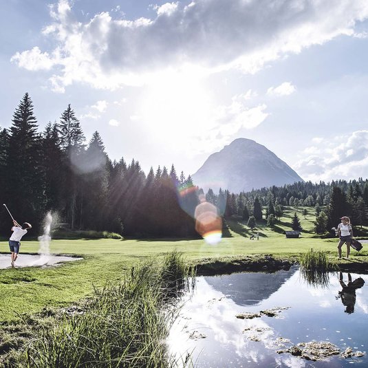 Shot of large lake on golf course near golf hotel Seefeld