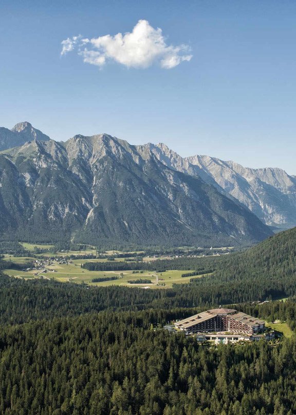 Aerial view of the region including Interalpen-Hotel Tyrol in summer