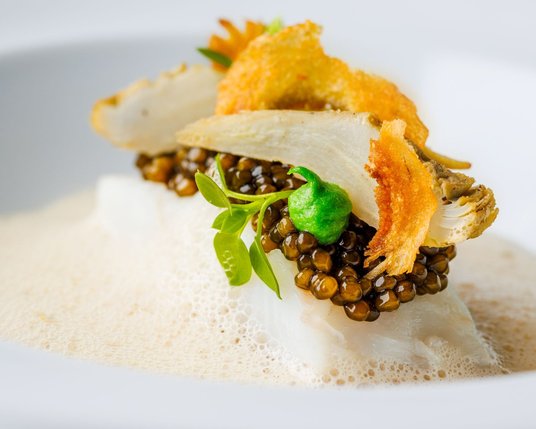 Turbot on the bone with koji beurre blanc, poverade, and caviar