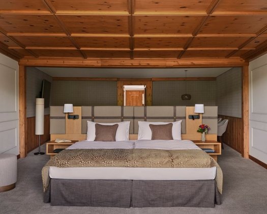 Enjoy the view when you wake up in select Deluxe Double Rooms Our Deluxe Double Room with a bed facing the window