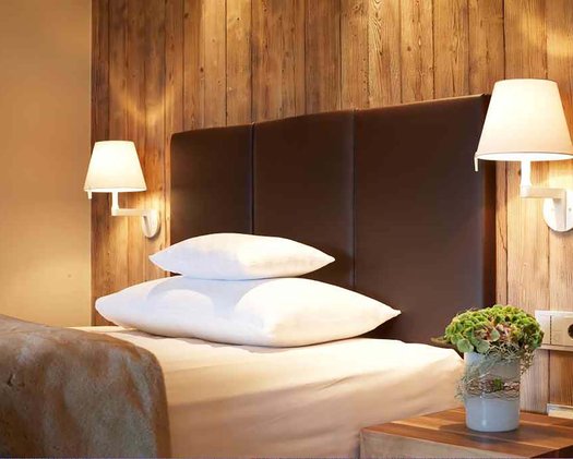 Lodge Deluxe Zimmer Twin Detailaufnahme eines Bettes in einer Lodge des Hotels