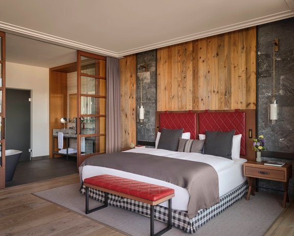 The cozy open sleeping area of the penthouse superior suite